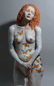 Sandy Frank sculpture red haired woman monarchs across body