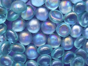 Iridescent blue flat beads, flat on bottom, domed on top. shined violet and periwinkle